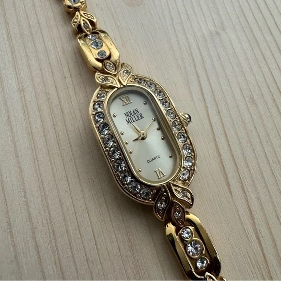 Nolan Miller Gold Toned Crystals Women's Watch